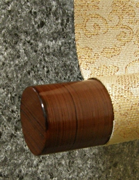 Lacquered Roller End
