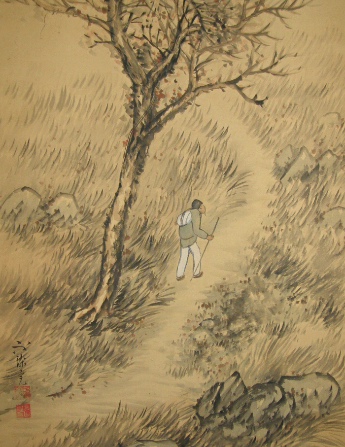 Man Walking on Mountain Trail