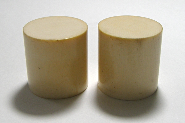 A pair of roller ends made from Ivory