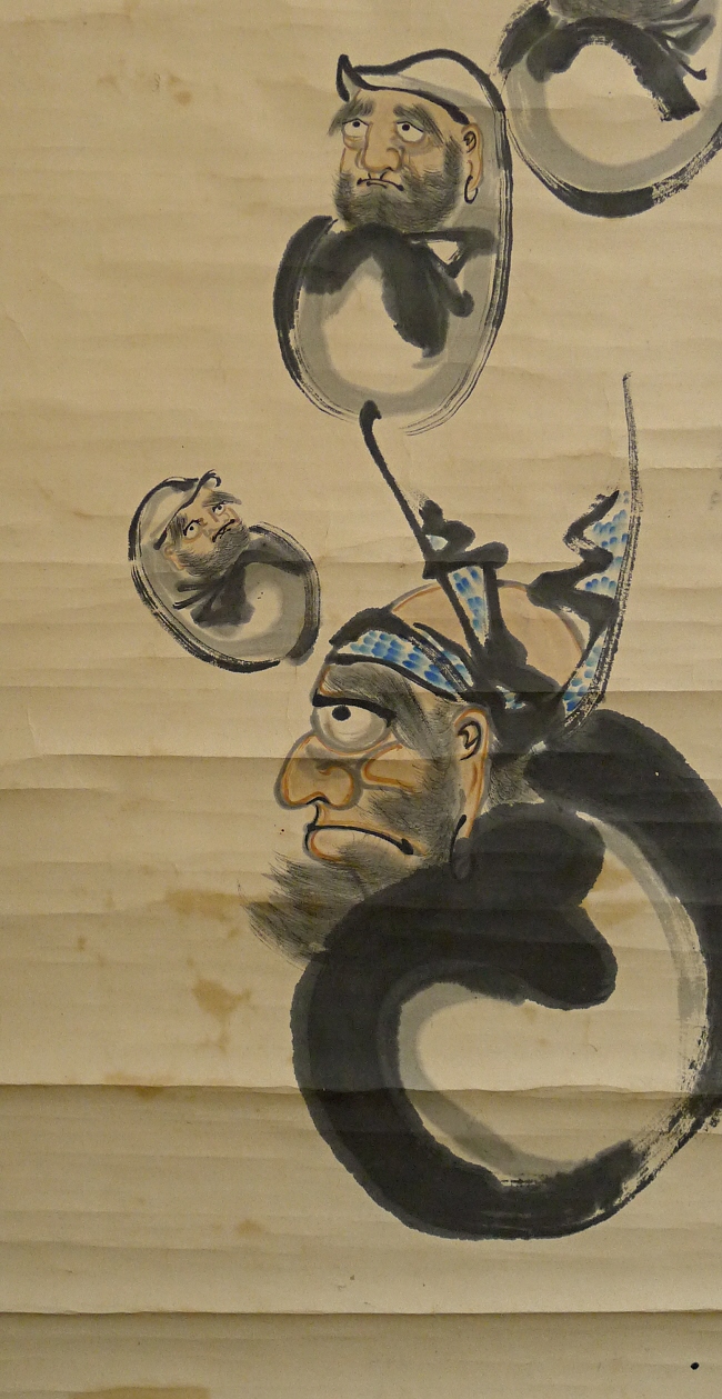 Darumas are depicted humorously