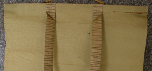 Tears at the Top part of the mounting