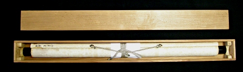In Wooden Scroll Box