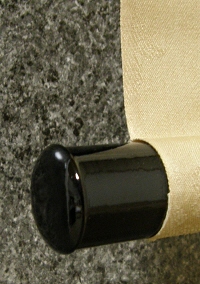 Lacquered Roller End