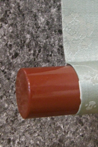 Lacquered Roller End