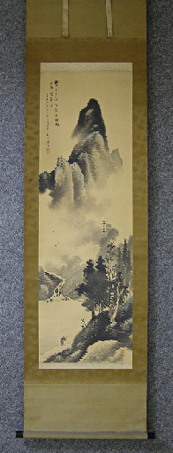 A Monk Walking along a River