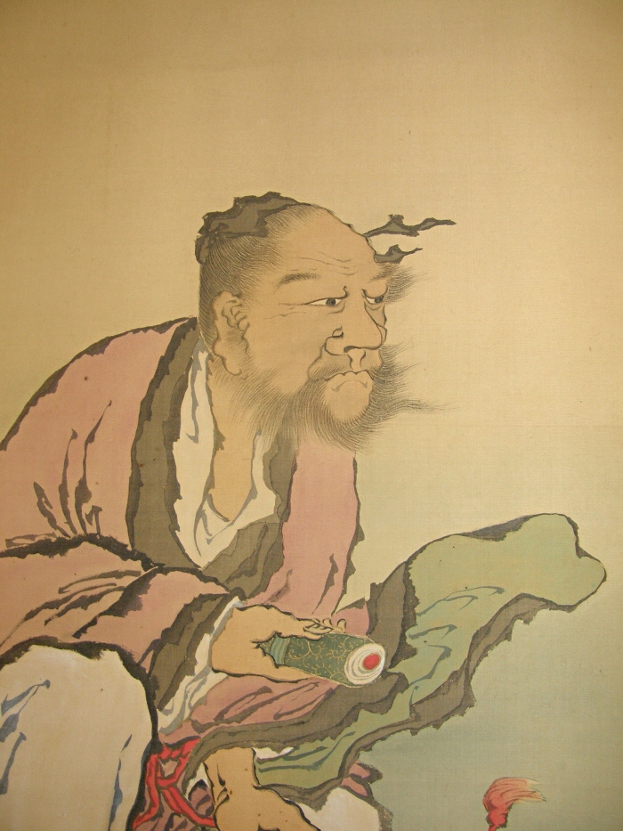 Carp Hermit holding a Sutra