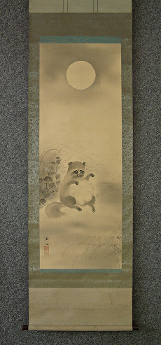 A Raccoon Dog under the Moon